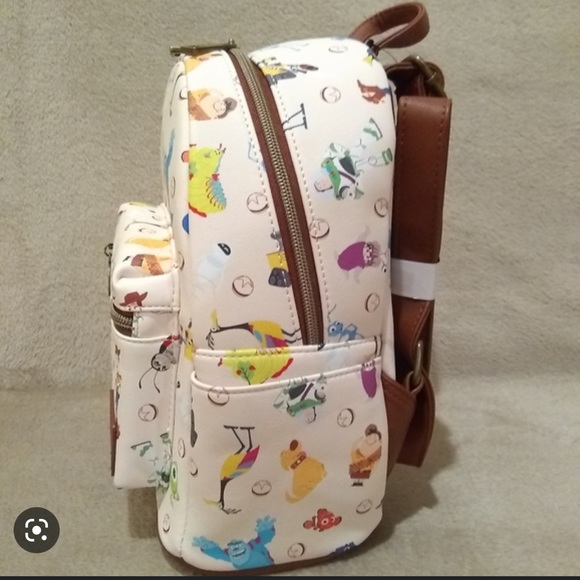 New Pixar 25th anniversary Loungefly - Picture 2 of 4